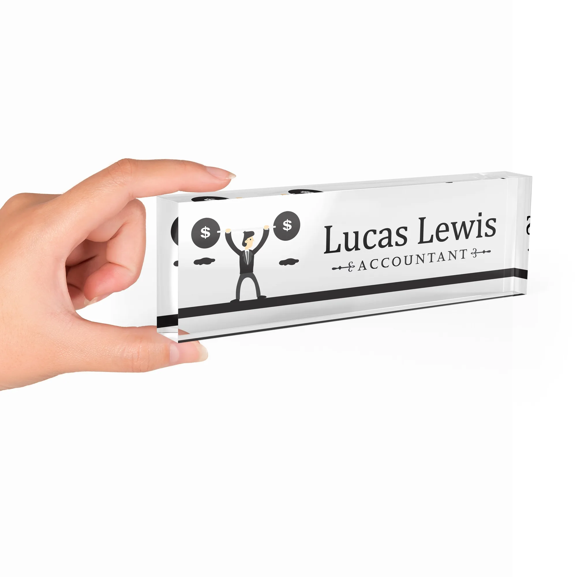 Hand holding a clear acrylic desk name plate with a cartoon accountant design