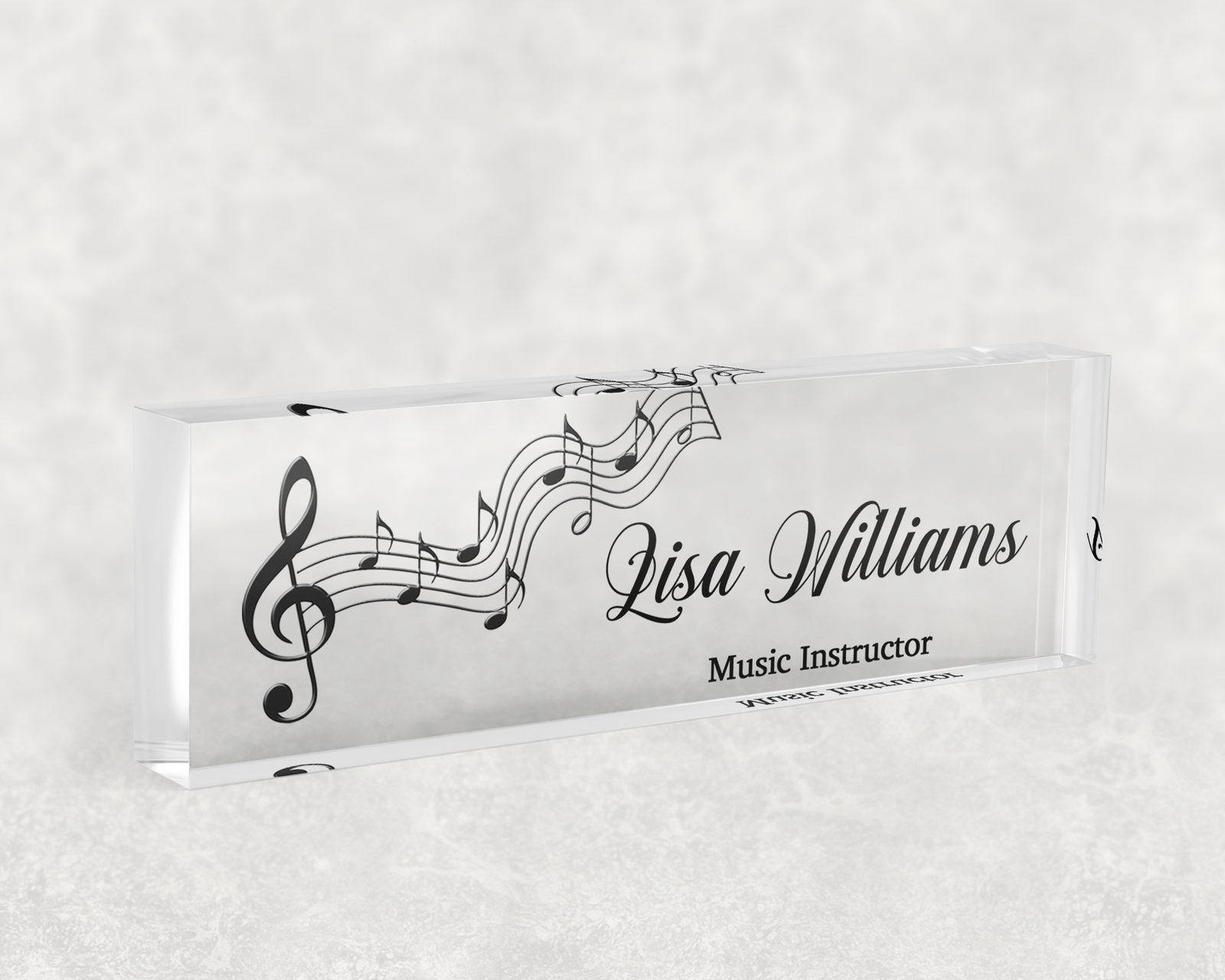 Treble clef and notes desk name plate in clear acrylic, personalized with a name and job title