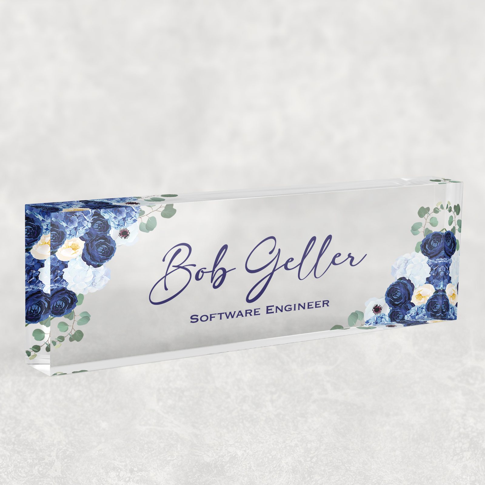 Navy and cornflower floral desk name plate in clear acrylic, personalized with a name and job title