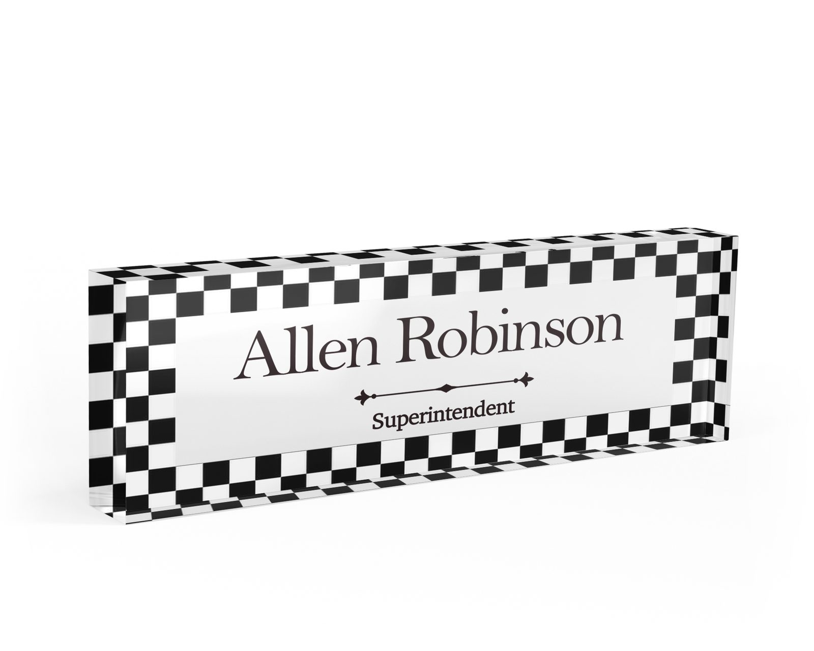 Black and white checkerboard desk name plate in clear acrylic, personalized with a name and job title