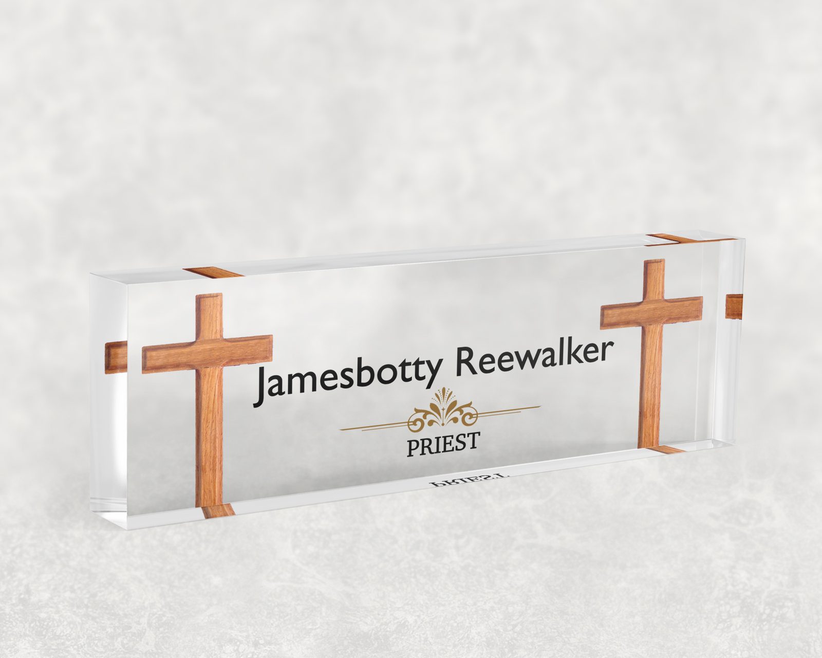 Wooden cross desk name plate in clear acrylic, personalized with a name and job title