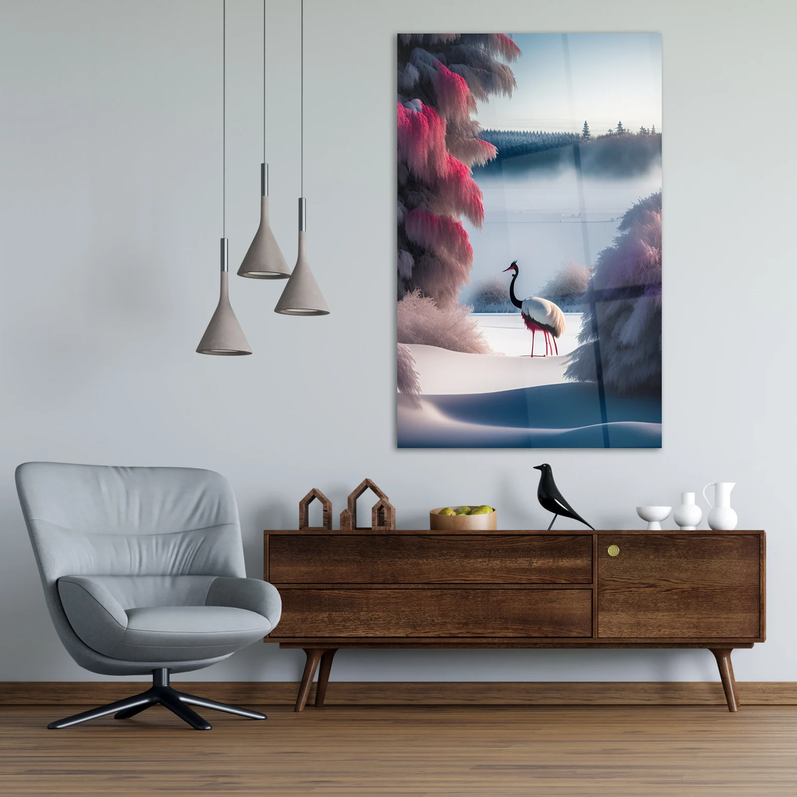 White crane in snowy landscape glass wall art shown in a modern living room