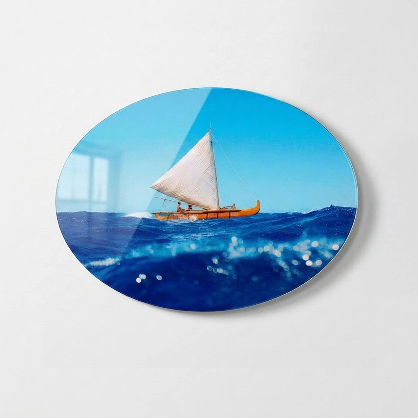 Traditional Sailboat on Blue Waves Horizontal Oval Glass Wall Art, front product view on a neutral background
