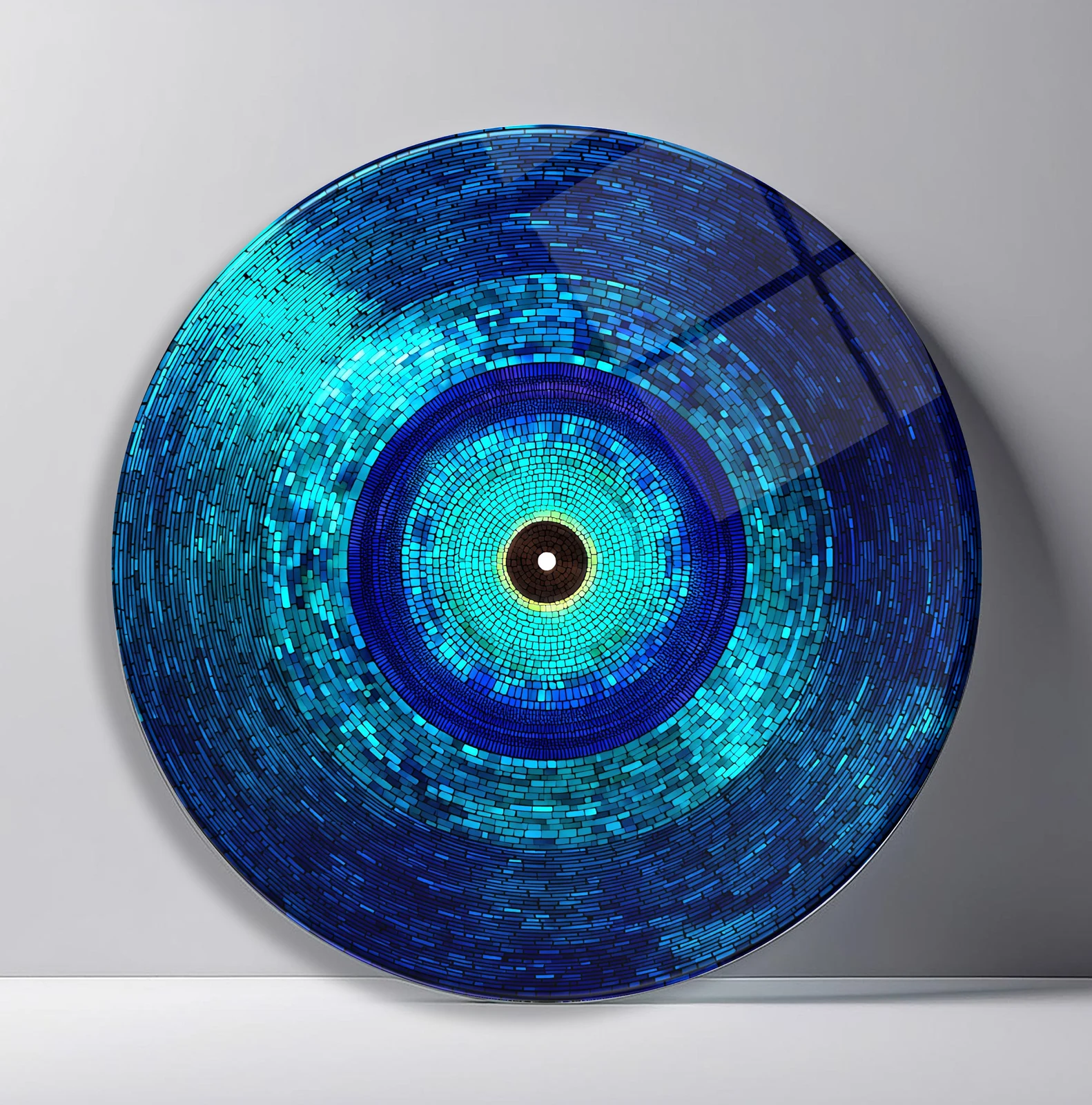 Deep Ocean Mosaic Orbit Round Glass Wall Art featuring layered blue tile rings fading from turquoise to midnight