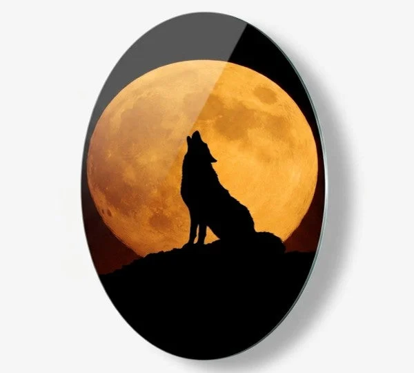 Wolf Silhouette Full Moon Oval Glass Wall Art, front product view on a neutral background