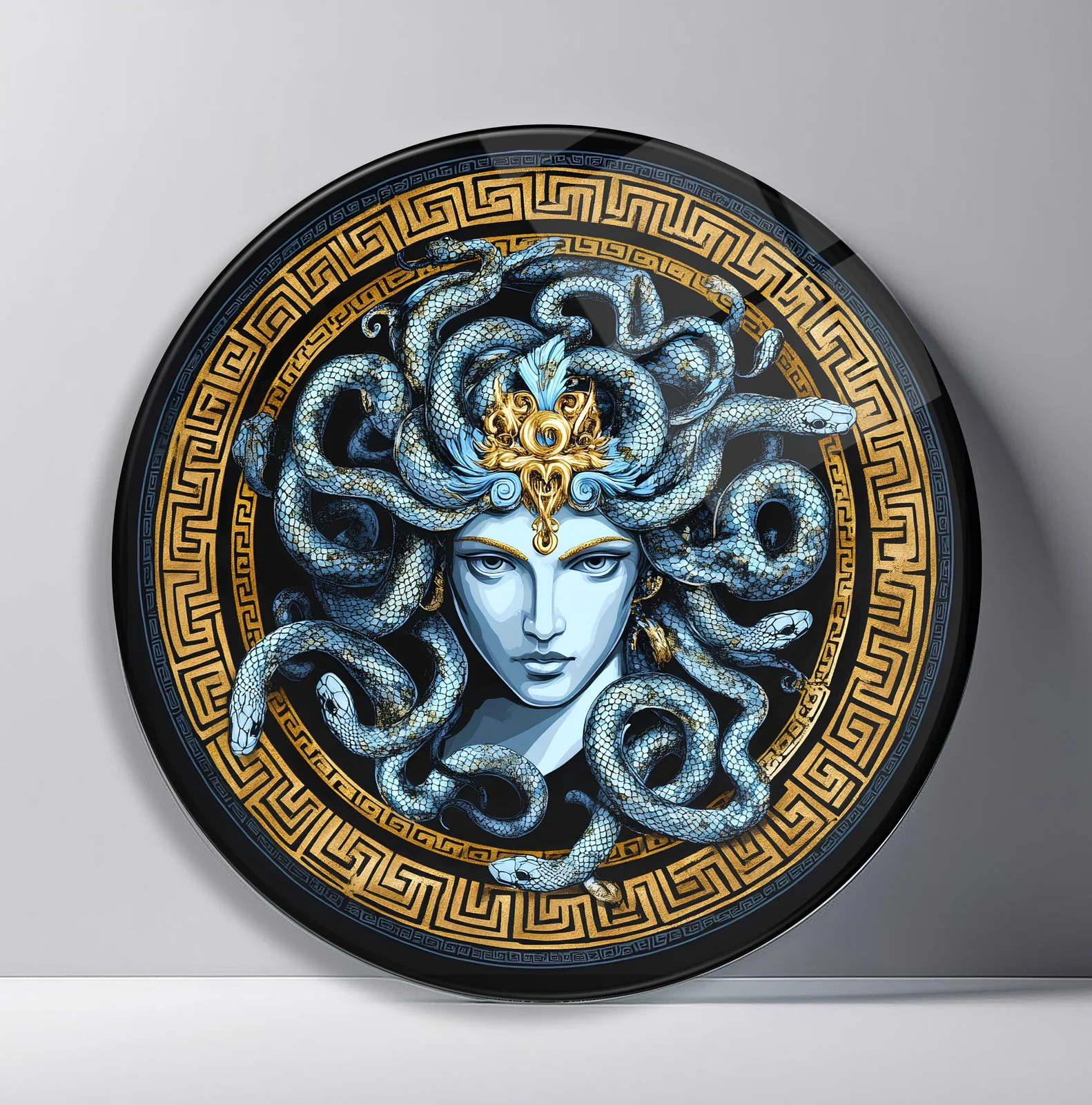 Medusa in Greek Key Frame Round Glass Wall Art featuring classical Medusa portrait surrounded by a bold Greek key border