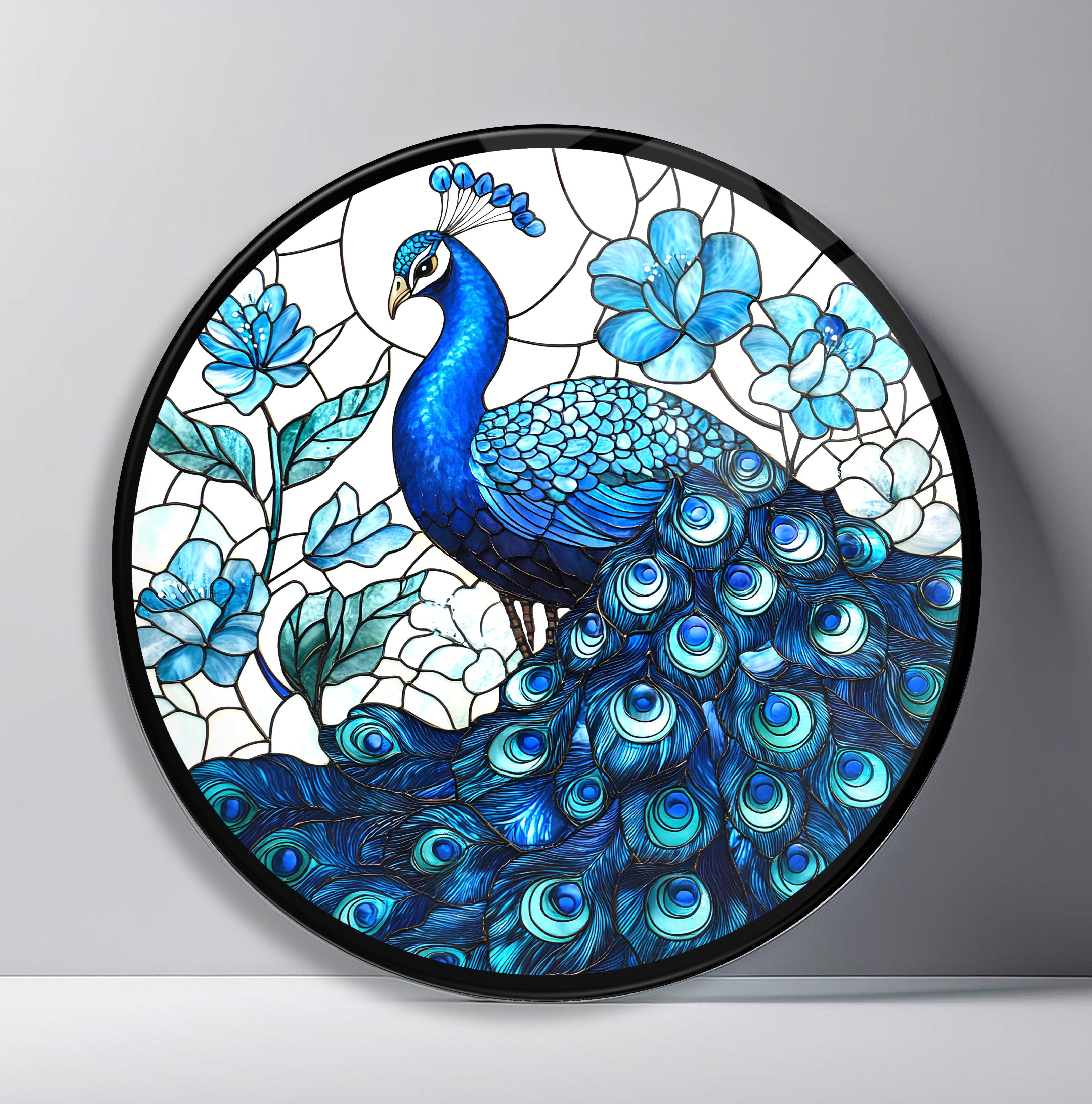 Royal Peacock and Blue Blossoms Round Glass Wall Art front view, leaning against a neutral wall