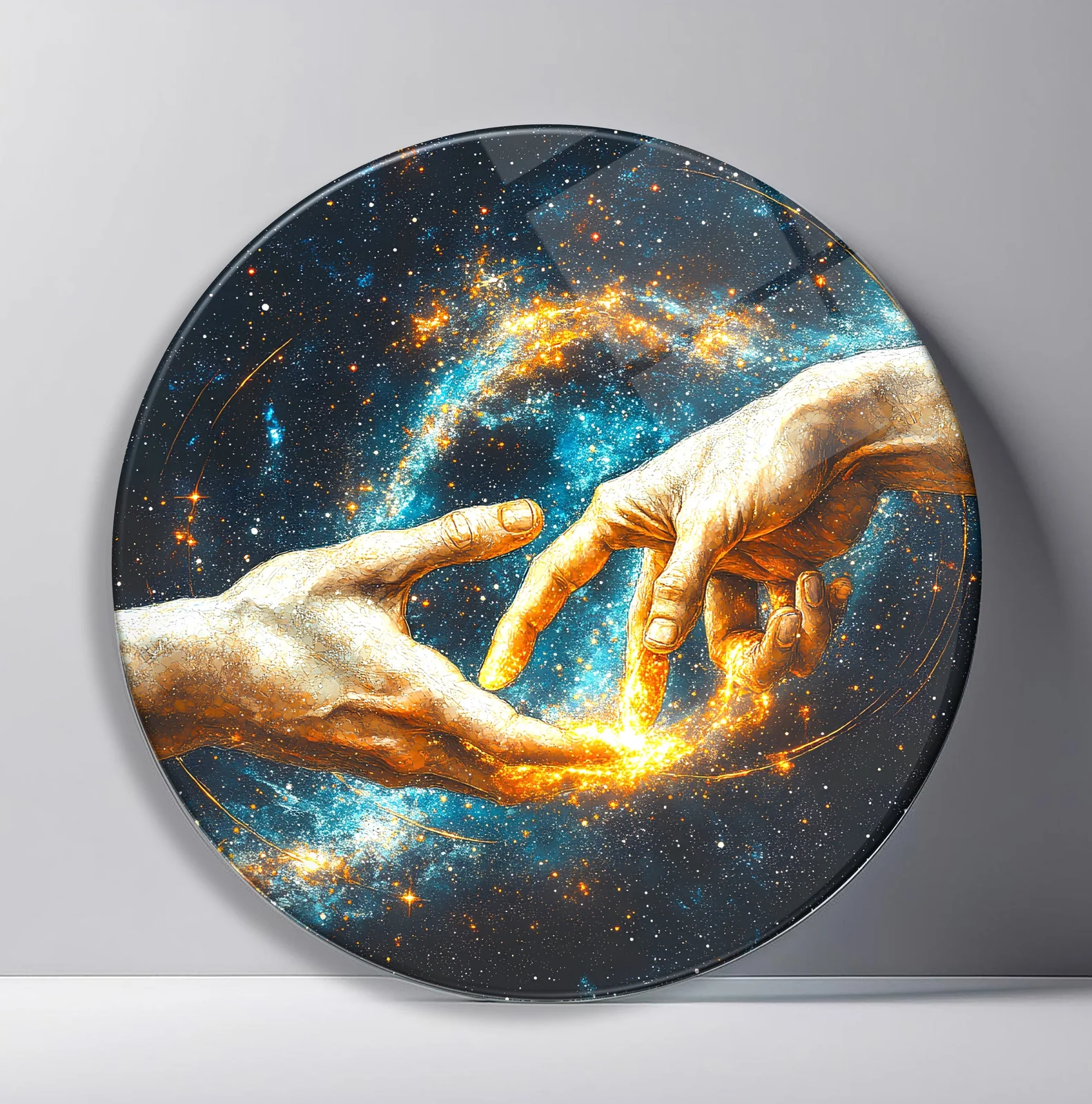 Touch of Creation in the Cosmos Round Glass Wall Art featuring two hands reaching toward each other across a star-filled galaxy