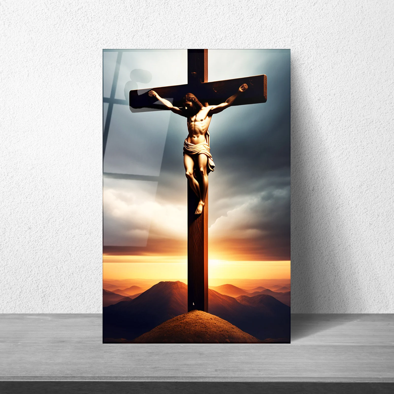 Jesus on the cross at sunset glass wall art as a statement piece in a hallway