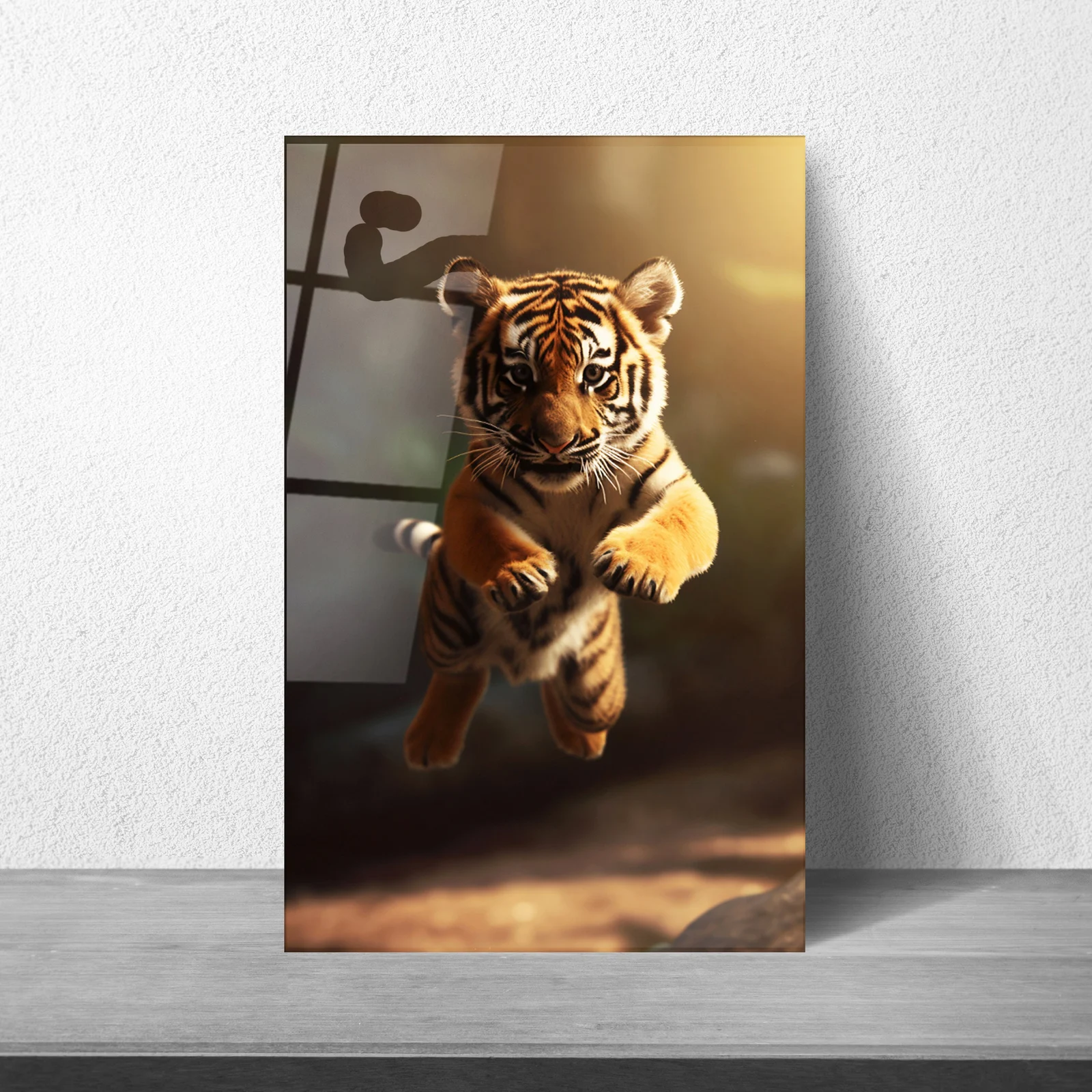 Leaping tiger cub glass wall art styled in a contemporary interior