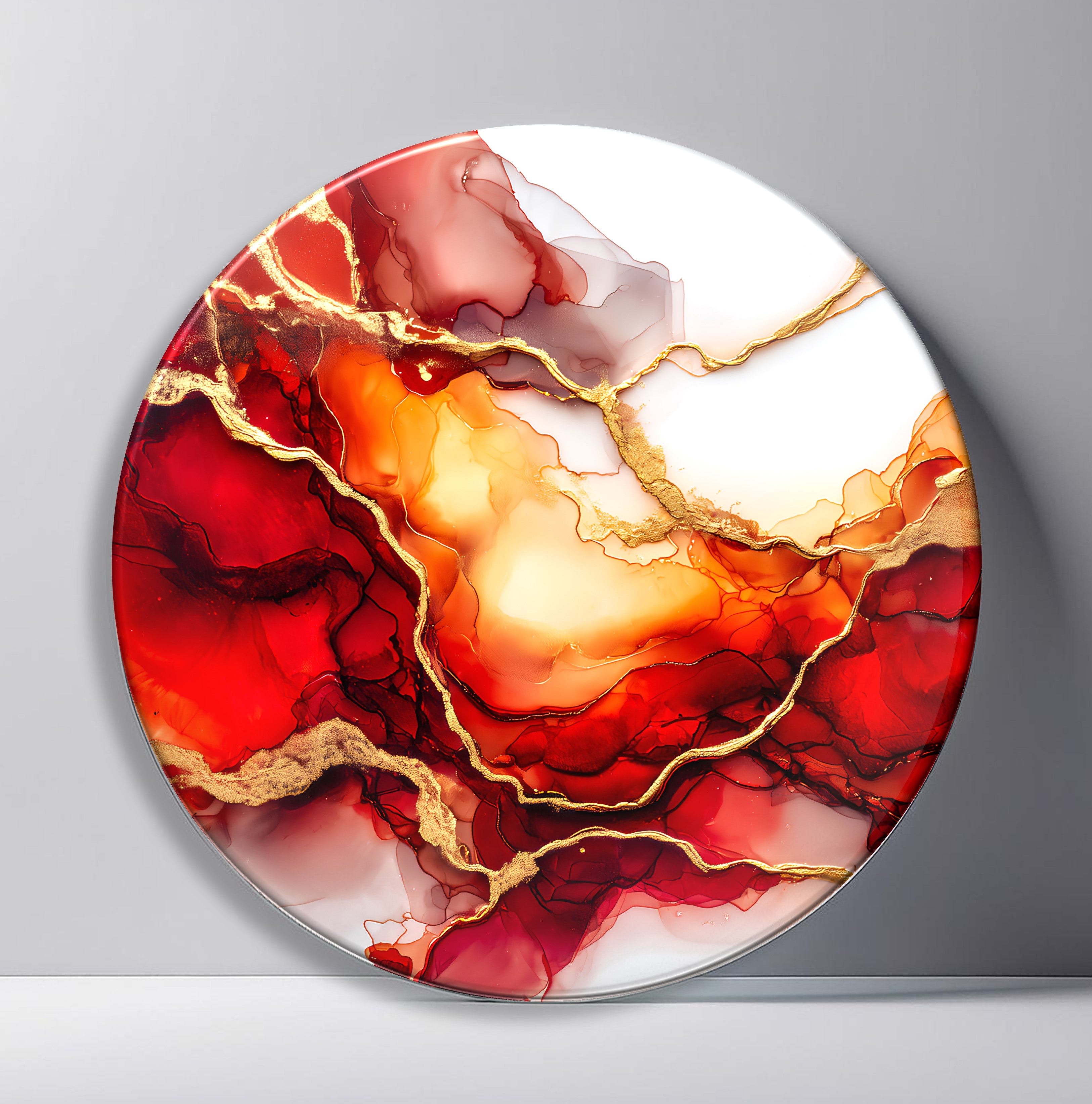 Crimson Gold Marble Round Glass Wall Art front view, leaning against a neutral wall