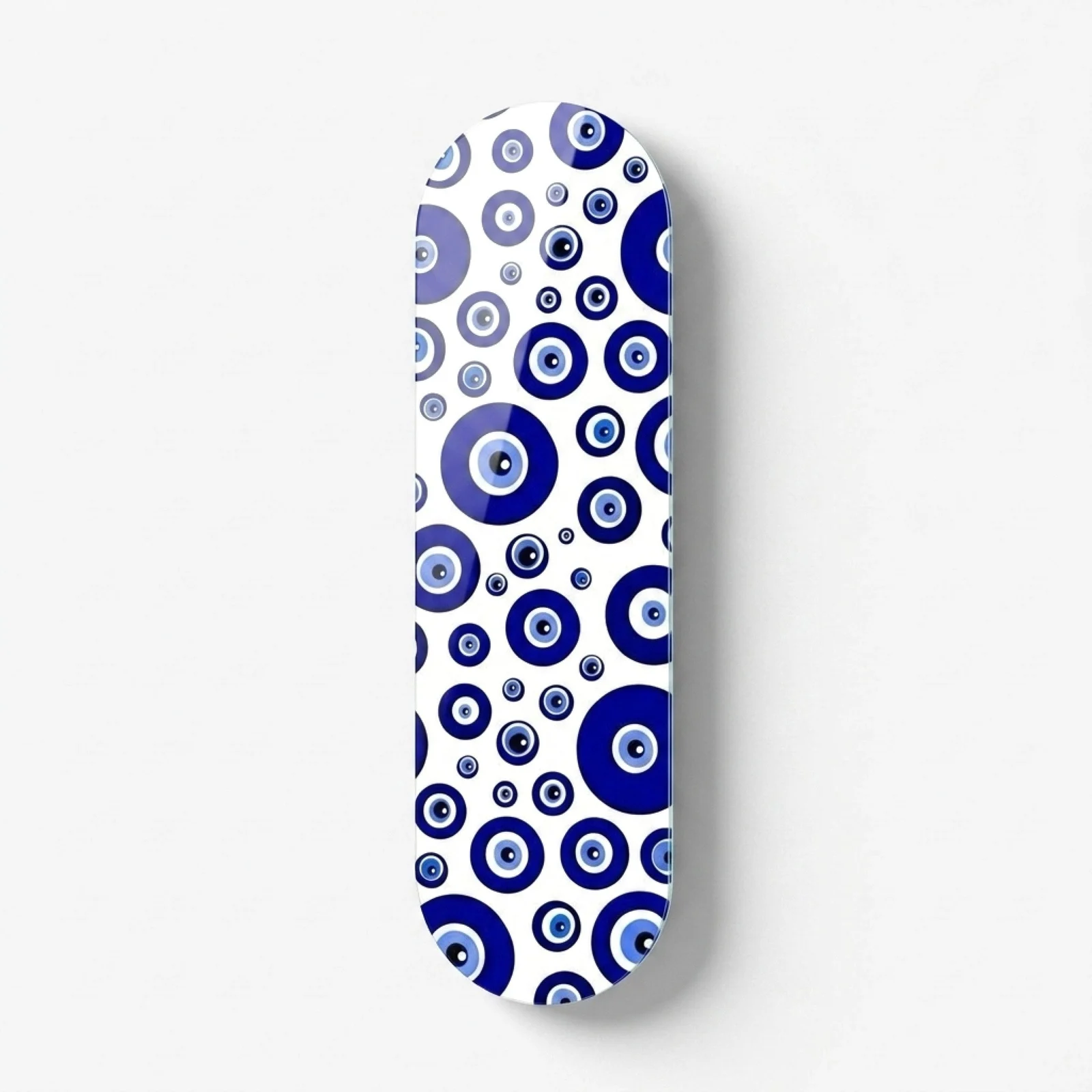 Blue Evil Eye Pattern Skateboard Glass Wall Art, front product view on a neutral background